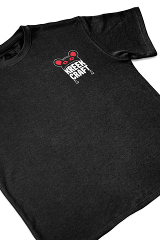 KreekCraft black Hacker tee with the KreekCraft logo in red and white on the left front chest, close-up.